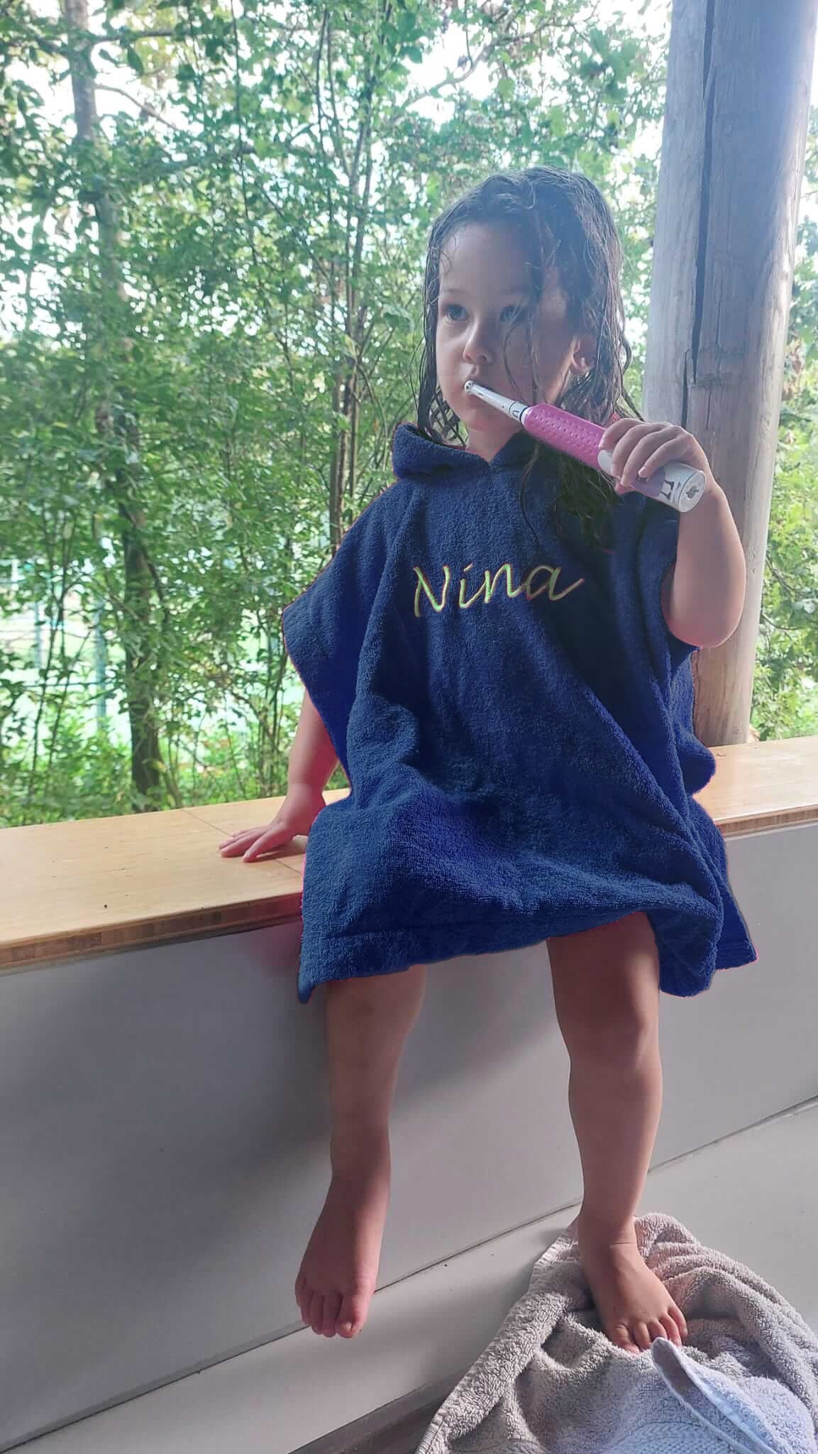 Embroidered bath cape