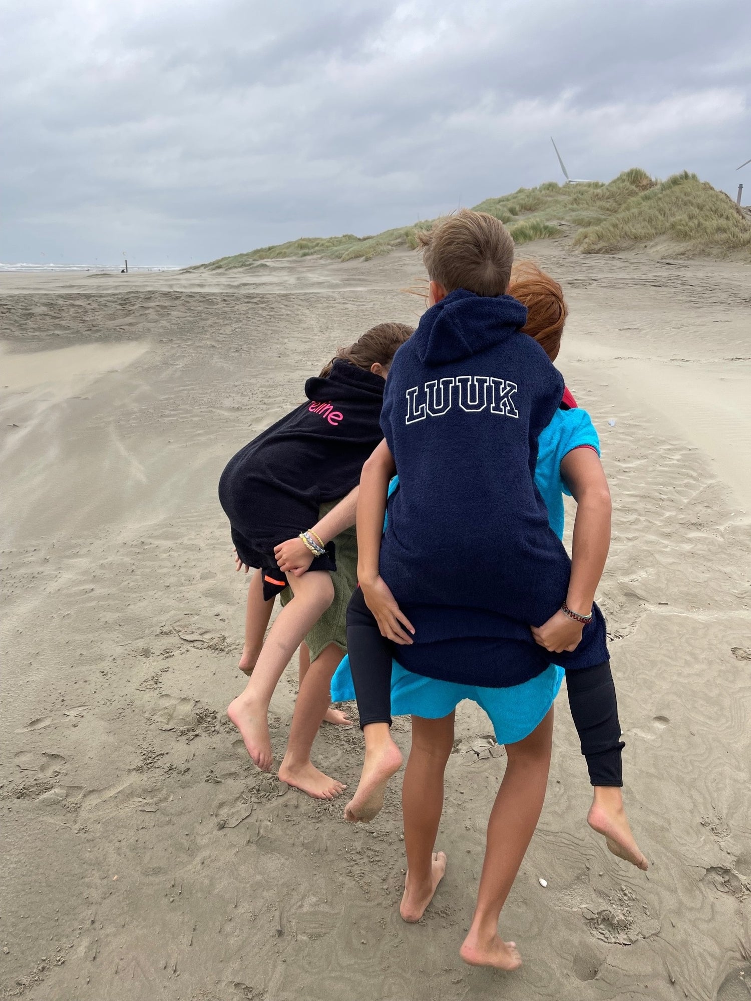 Gepersonaliseerde surfponcho's jongens & meisjes