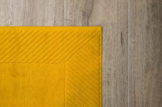 Luxe Badmat The One Toweling okergeel