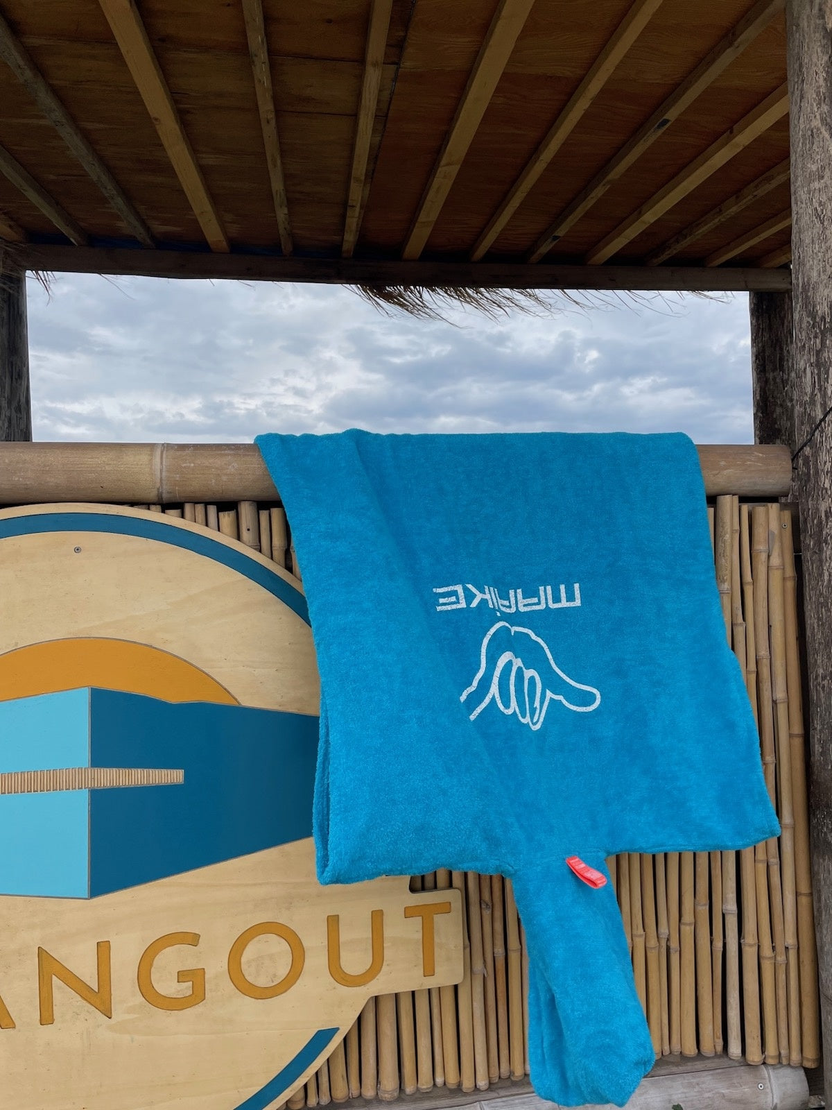 Shaka poncho met print