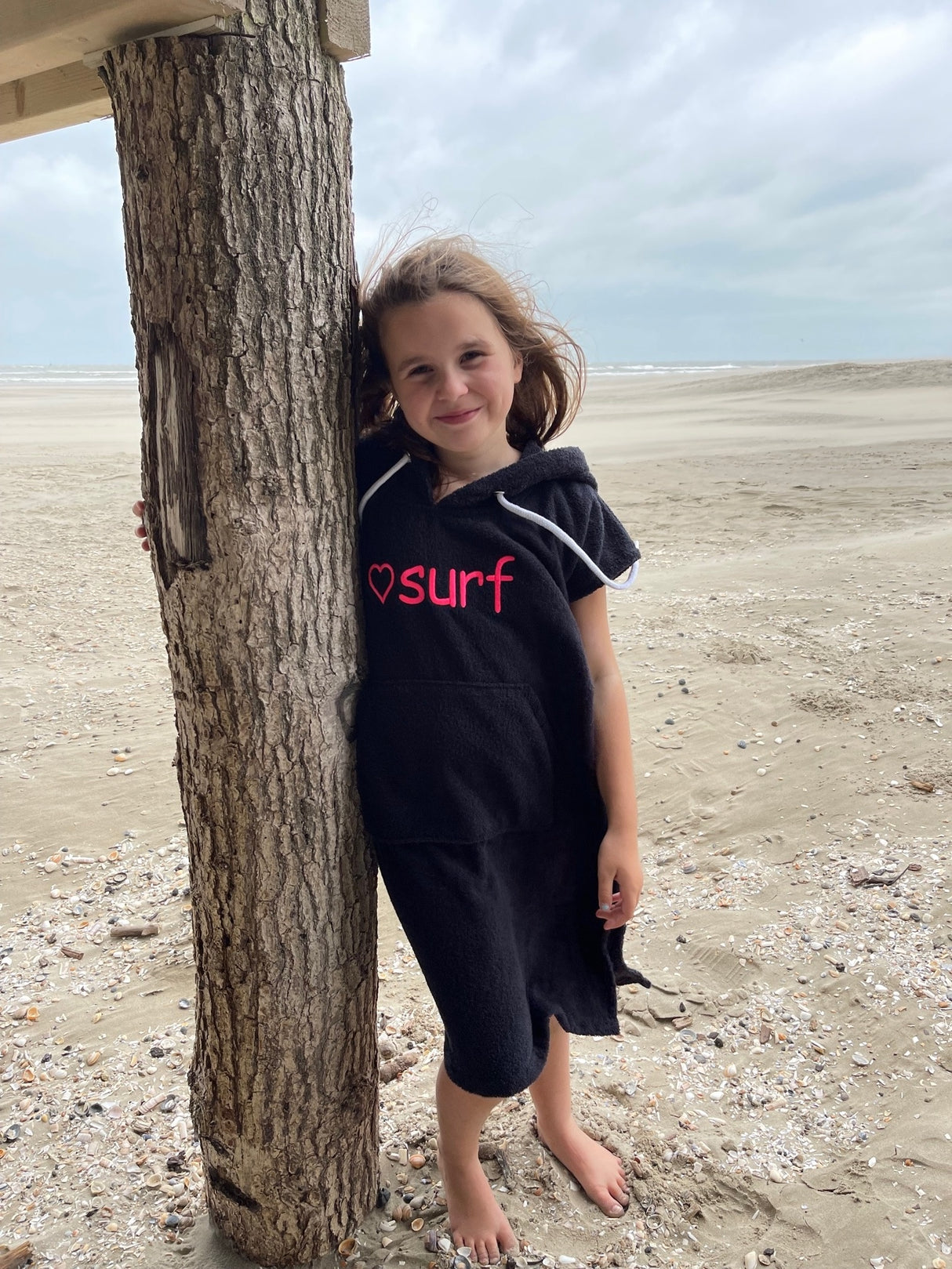 Zwarte kinder surfponcho met naam