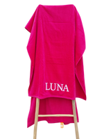 Geborduurd strandlaken velours