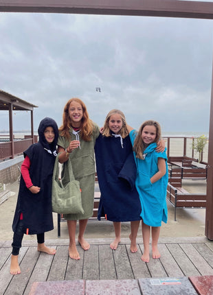 Kinder surfponchos's