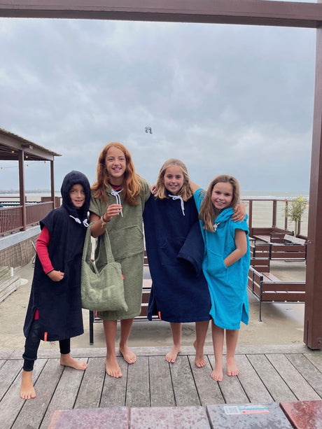 Kinder surfponchos's