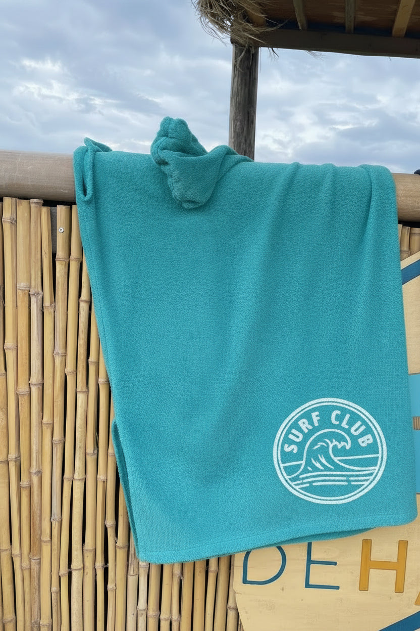 Poncho turquoise met print
