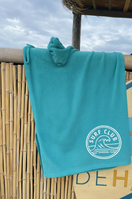 Poncho turquoise met print
