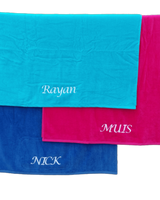 Geborduurd strandlaken velours